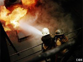 Пожар. Фото: РБК (c) Пожар. Фото: РБК (c)