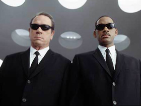 Секретная служба, кадр фильма "Люди в черном" (С) Секретная служба, кадр фильма "Люди в черном" (С)