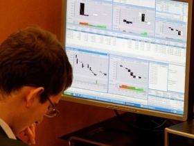 Трейдер на ММВБ. Фото с сайта yahoo.com Трейдер на ММВБ. Фото с сайта yahoo.com
