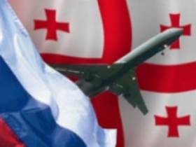 Российский и грузинский флаги. Коллаж с сайта vlasti.net Российский и грузинский флаги. Коллаж с сайта vlasti.net