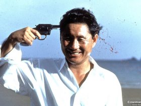 Самоубийство. Кадр из к/ф "Сонатина" (реж. Т.Китано) Самоубийство. Кадр из к/ф "Сонатина" (реж. Т.Китано)