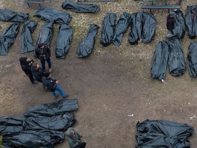 Обмен телами погибших. Фото: apimagesblog.com Обмен телами погибших. Фото: apimagesblog.com