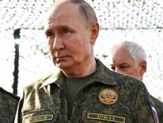 Путин в военной форме. Фрагмент фото: РГ.Ru